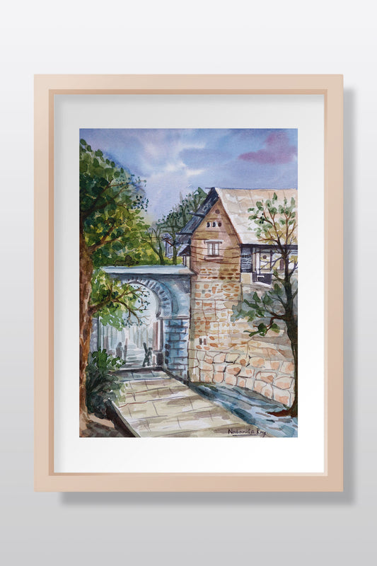 Framed watercolor cityscape painting featuring a quaint house among bustling streets, highlighting urban serenity. Original painting.